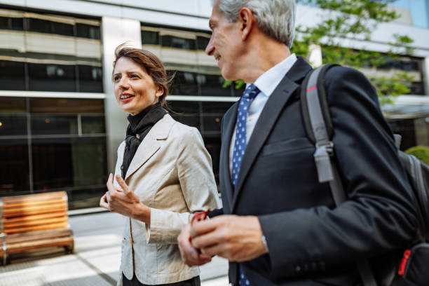 istock Mature Latino business people going home after work 1355691195