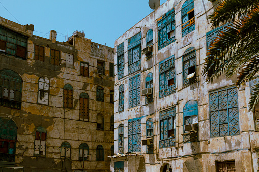 Detail of old buildings, some of them abandoned, in the old district of Jeddah, a UNESCO world heritage site.