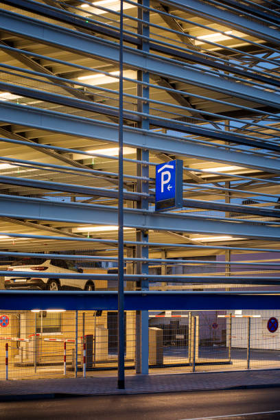 istock Facade of a modern parking garage 1355695032