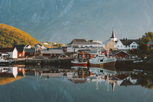 Norway landscape Reine village and fjord reflection in a water morning view Travel scenery exploring Lofoten islands