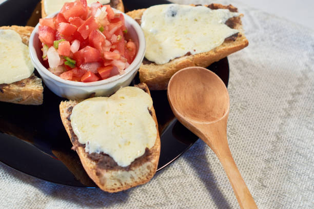 istock Traditional Mexican breakfast of molletes served. 1355697296