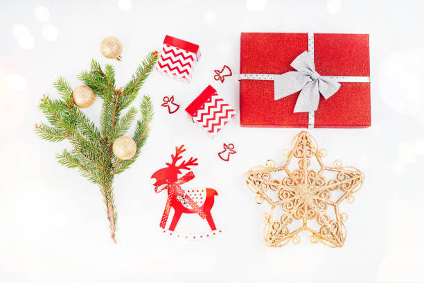 istock Wooden decorative Christmas tree with decorations and spruce branches.Bright Winter holiday composition.Christmas,winter,new year concept.Shiny background.Simple minimalistic Christmas home decor. 1355698149