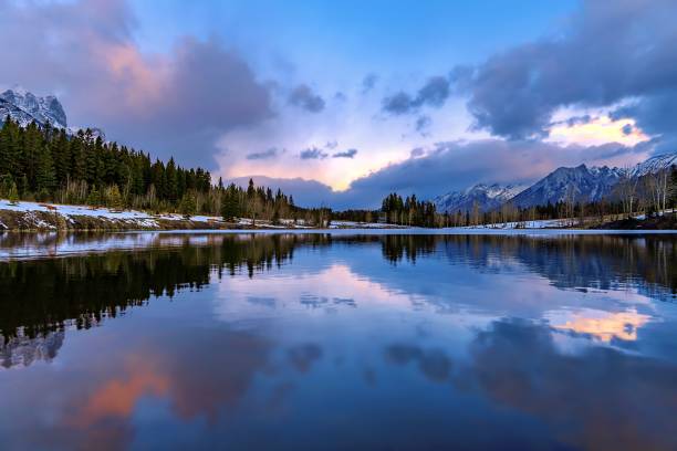 istock Panoramic Cloudy Sunrise Reflecting On Quarry Lake 1355698383