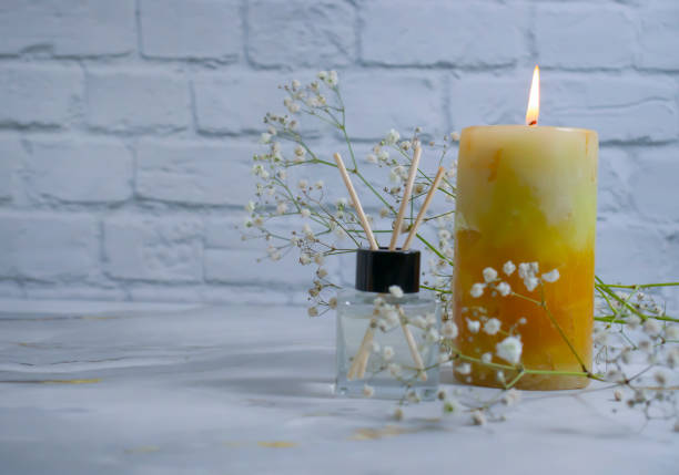 istock home fragrance, flower, candle burns 1355702629