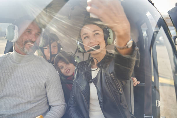 istock Lovely parents taking kids on a memory-making aerial trip 1355710071