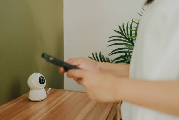 Security camera. IP Camera connect to smart phone. stock photo