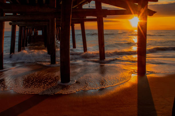 istock Sunrise at the Sandbridge pier 1355712044