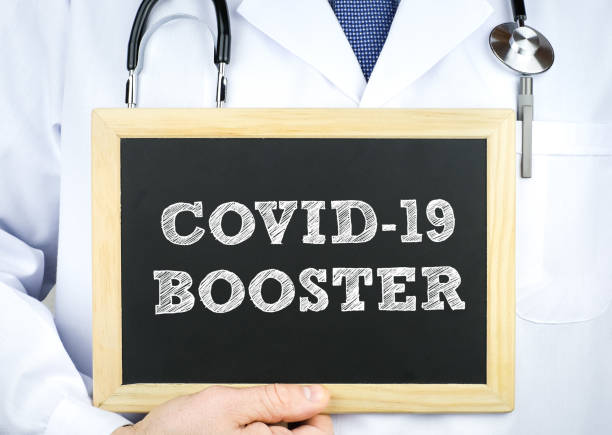 Covid-19 booster vaccination stock photo