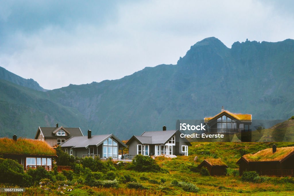 Cottage houses village traditional architecture cozy home in mountains of Norway Log Cabin Stock Photo