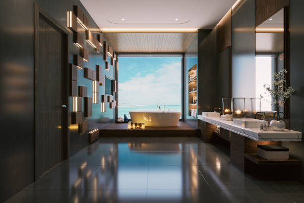 moderno bagno di lusso interno con vasca idromassaggio e splendida vista sul mare - luxury hotel looking through window comfortable foto e immagini stock