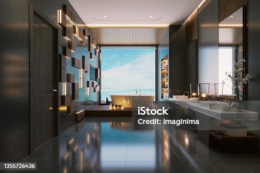 istock Modern Luxury Bathroom Interior With hot tub And Beautiful Sea View 1355726436