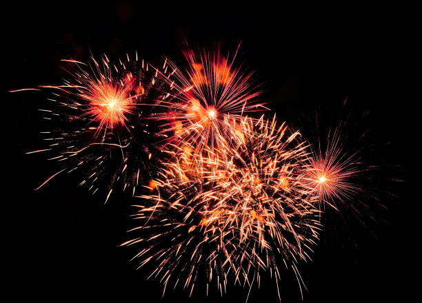 istock Red yellow smoke fireworks at black night sky 1355727582
