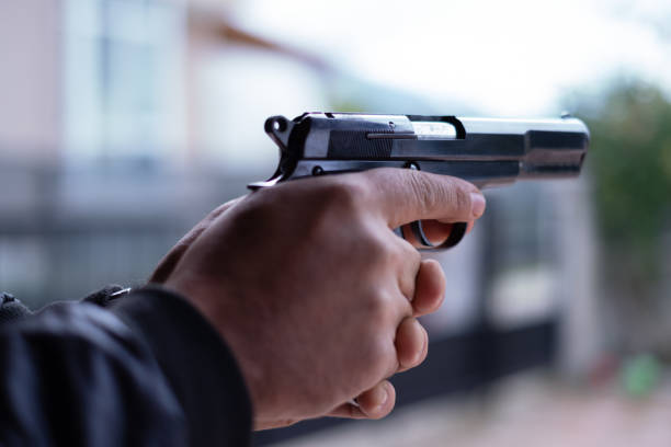 istock Black Pistol Gun Violence 1355729099