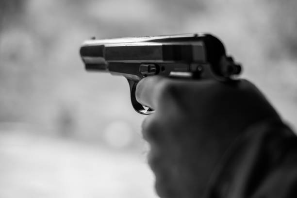 istock Black Pistol Gun Violence 1355729634
