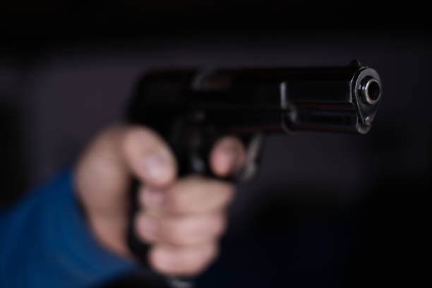 istock Black Pistol Gun Violence 1355729635