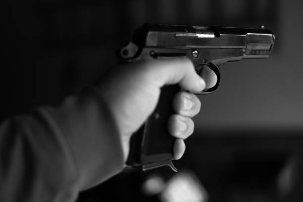 istock Black Pistol Gun Violence 1355729640