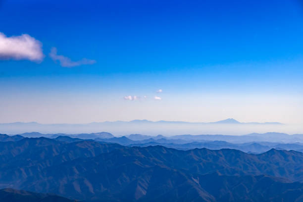 Blue sky and mountains Mt. Tsukuba seen in the distance Blue sky and mountains Mt. Tsukuba seen in the distance mt akagi stock pictures, royalty-free photos & images