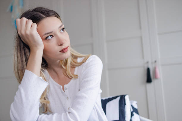 istock Unhappy woman suffering from depression 1355732227