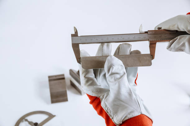 istock precise measurement of metal parts on a white background using a vernier caliper 1355733378