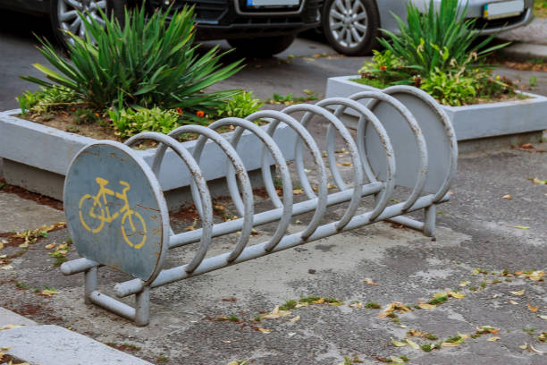 Empty bike rack in the city center near the sidewalk