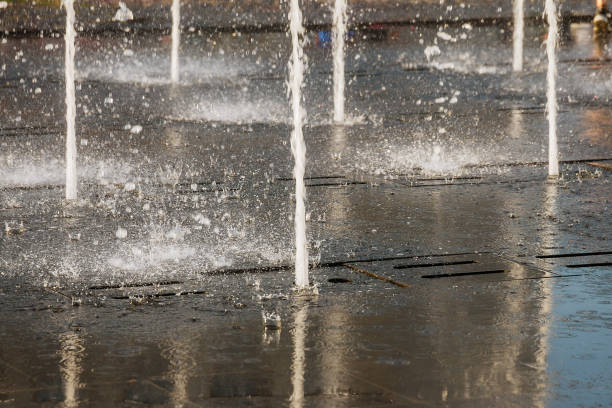 istock Fountain on a hot summer day in the city. 1355733413