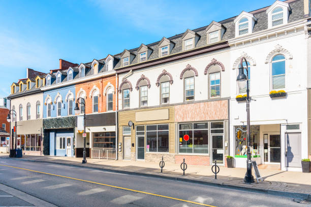 istock Traditional architecture with shops on ground level in a historic district on a sunny autumn day 1355734047