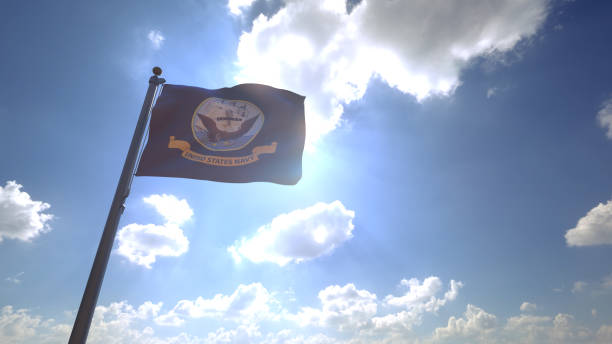istock United States Navy Flag on a Flagpole 1355741876