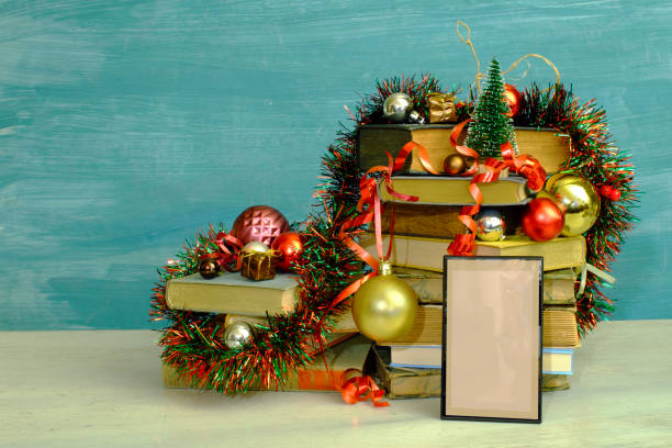 istock Giving E-books for christmas with christmas decoration and e-book reader.Reading,literature,education,gift,present,christian holiday concept, copy space 1355744077