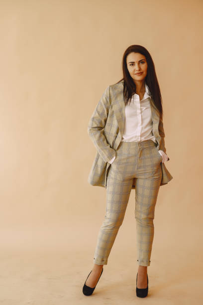 istock Fashion girl posing in a photo studio 1355747310