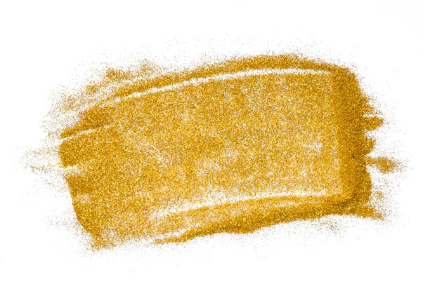 istock Gold glitter on white background. Abstract brush strokes texture. 1355747737