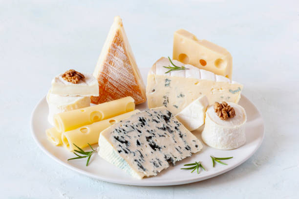 istock Cheese plate with different types of french cheese 1355750761