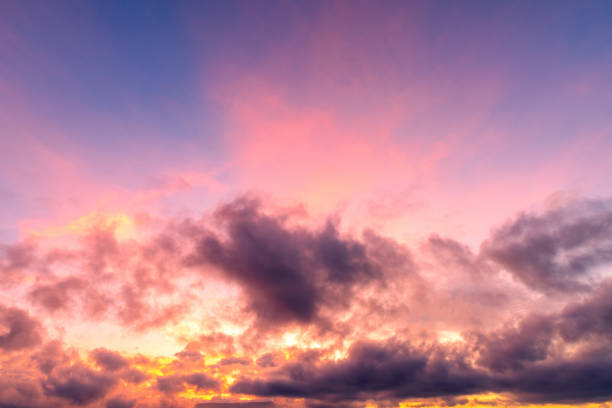 istock Beautiful sky. Clouds in twilight sky in evening. Colorful sky in twilight time. 1355759345