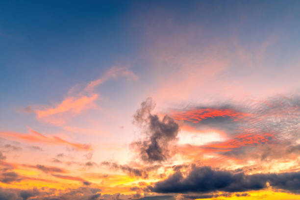 istock Beautiful sky. Clouds in twilight sky in evening. Colorful sky in twilight time. 1355759351