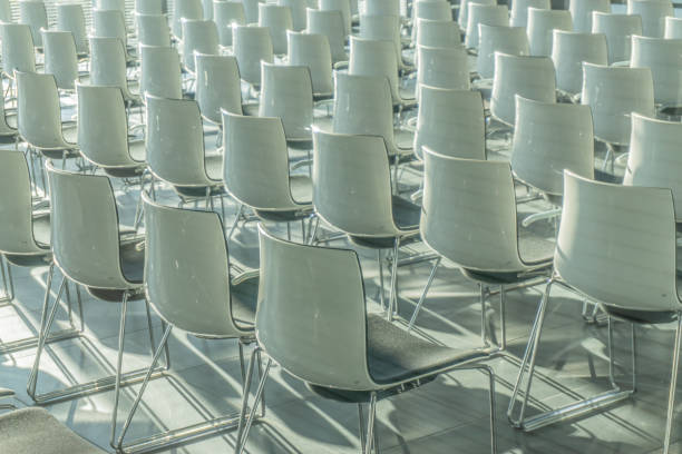 istock White chairs in conference room 1355766602