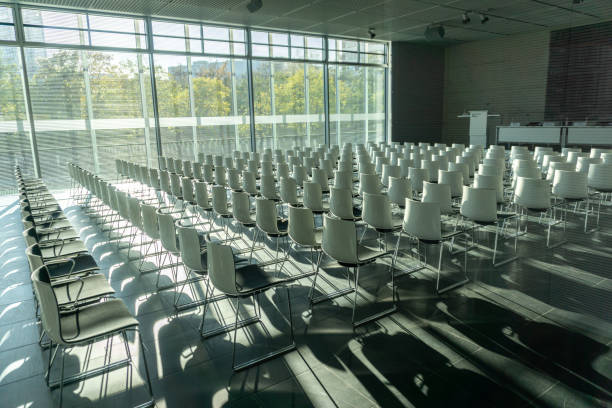 istock White chairs in conference room 1355766641