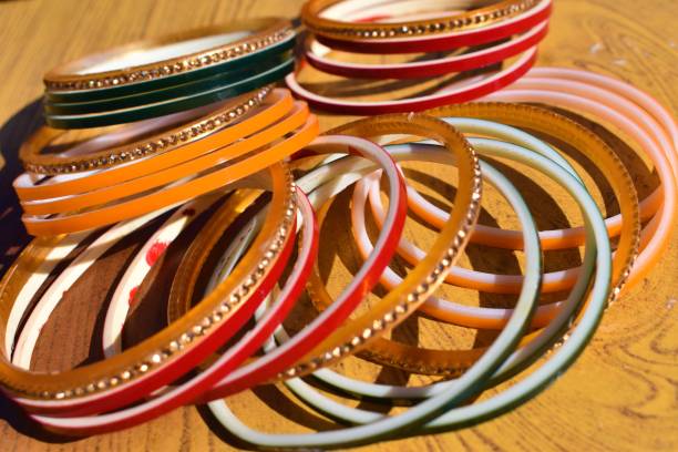 istock Beautiful and multicolor Indian Bangles closeup and selective focus 1355767516