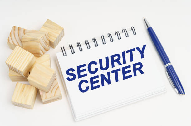 istock On the table are cubes, a pen and a notebook with the inscription - Security Center 1355775598
