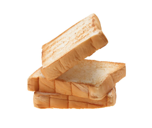 istock Slices toast bread isolated on white background 1355775907