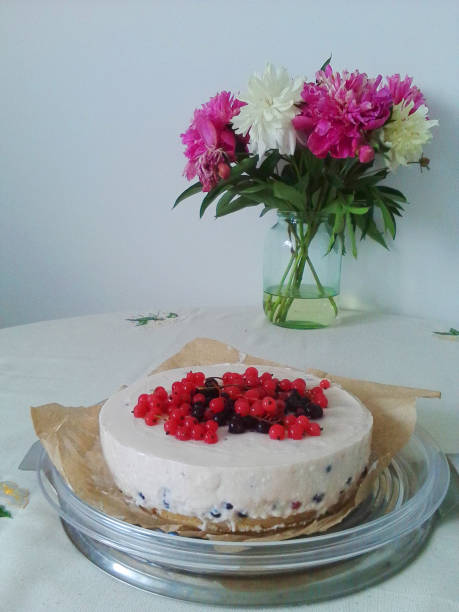 istock cheesecake with red and black currants on the table 1355779197