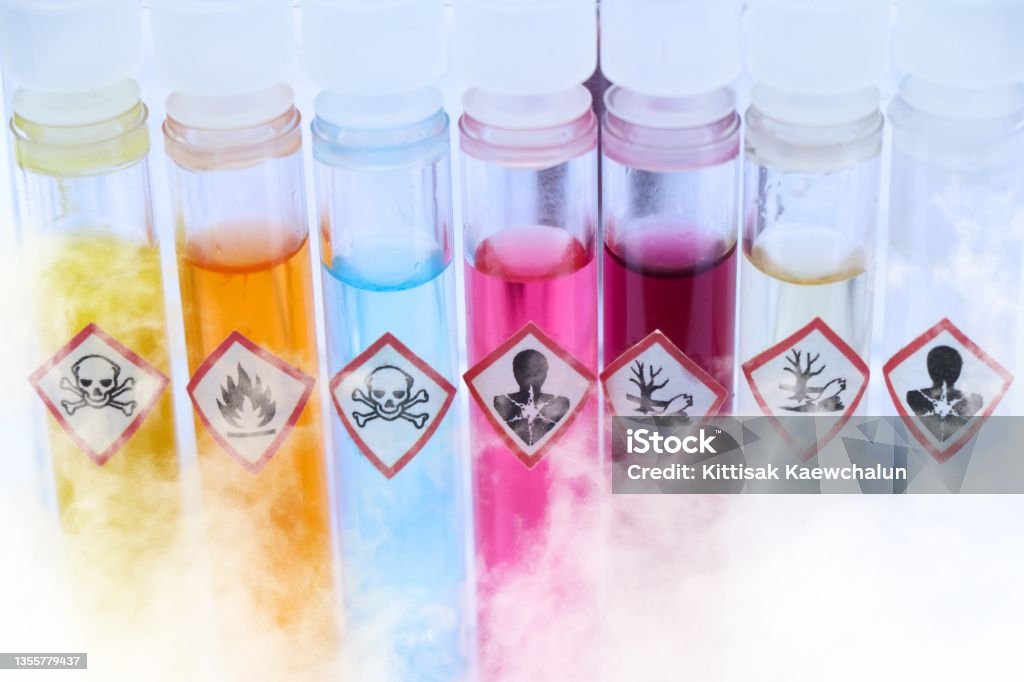 Chemicals in test tubes and symbols used in laboratory Chemicals in test tubes and symbols used in laboratory or industry Chemistry Stock Photo