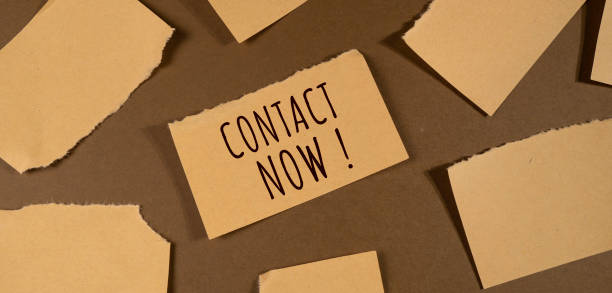 istock Close up of Contact Us Word 1355790469
