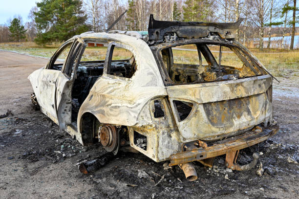 istock car totaly burnt up standing in rural site 1355797580