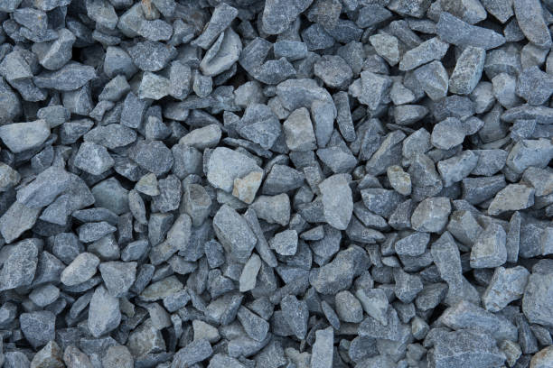 istock Textured background from gravel close-up. Hard rock. Construction material 1355799610