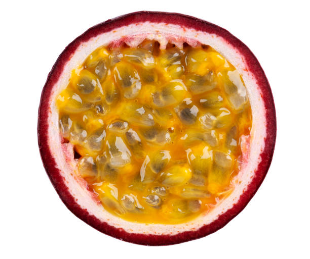 istock Passion fruit isolated on white background. Slice of passionfruit or maracuya, exotic fruit. Clipping path. Top view. 1355799742