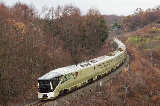 Date-city, Hokkaido, Japan - November 28, 2017 : TRAIN SUITE “SHIKI-SHIMA” running on S-shaped curve