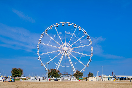 Beach of Rimini with the ferris wheel in background
