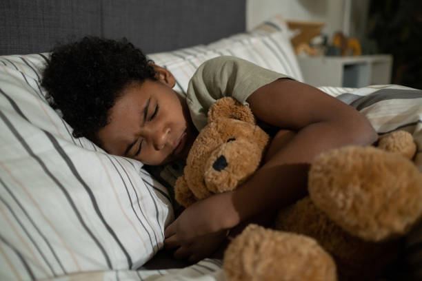 istock Troubled Sleep of Boy 1355807481
