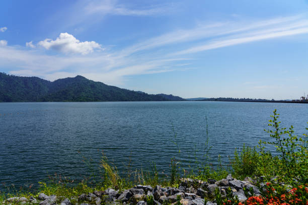 istock Mountains, sky and water in the dam. 1355808352