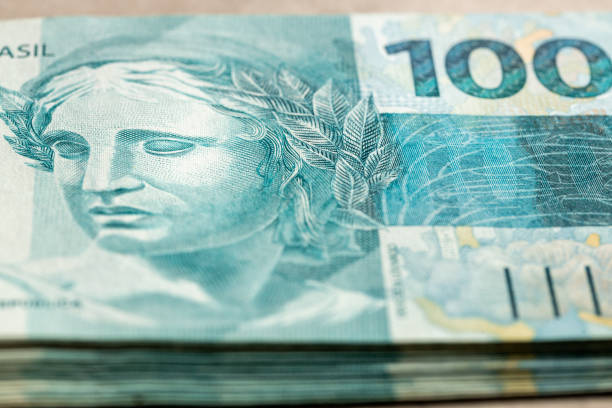 istock Brazilian Money File, 100 Reais Banknotes 1355808440