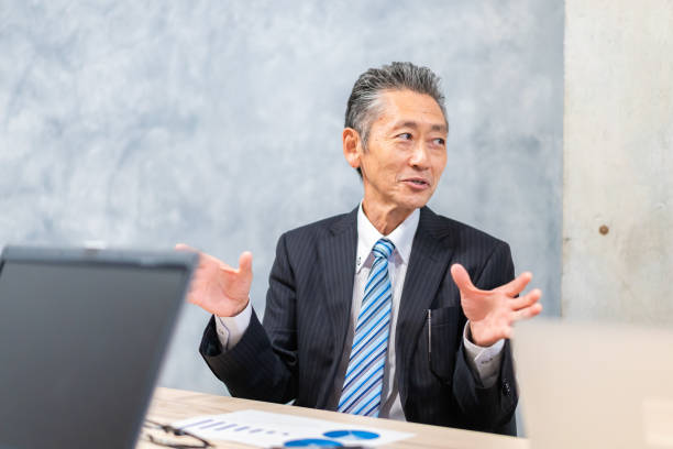 istock A manager in a suit expressing his opinion 1355809661